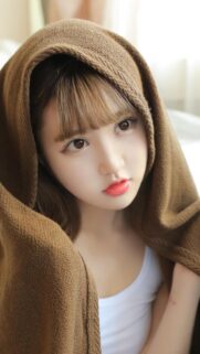 Beautiful Young Woman with Soft Brown Hood Portrait Wallpaper
