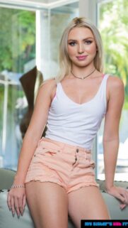 Beautiful Blonde Woman in White Tank Top and Peach Shorts Wallpaper for Mobile