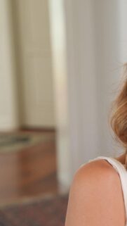 Elegant Woman with Blonde Hair Close Up Mobile Background