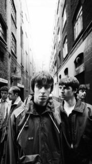 Iconic Oasis Band Members Black and White Street Photography Wallpaper