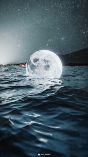Stunning Full Moon Rising Over Dark Ocean Waves Mobile Wallpaper