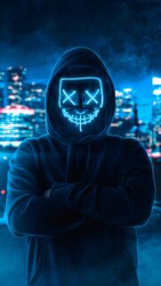 Neon Purge Mask Hooded Figure Cinematic Blue City Background Wallpaper