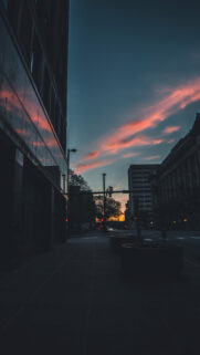 Stunning Urban Sunset Over City Street Mobile Wallpaper in High Definition