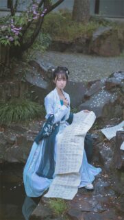 Beautiful Chinese Girl in Traditional Hanfu Writing Calligraphy Wallpaper