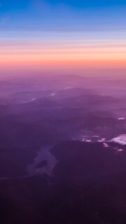 Stunning Aerial View of Purple Haze Mountains at Sunrise Wallpaper for Mobile