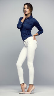 Stunning Fashion Model in Denim Shirt and White Jeans Wallpaper for Mobile