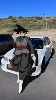 Goku Black Standing Before a Custom White Mitsubishi Lancer Evolution JDM Wallpaper