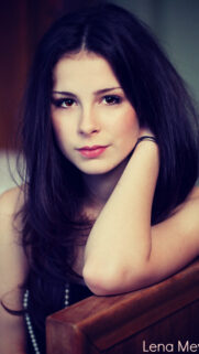 Stunning Portrait of Lena Meyer Landrut with Mesmerizing Dark Eyes Mobile Wallpaper