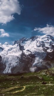 Majestic Snow Capped Alpine Mountain Peaks Wallpaper for Mobile