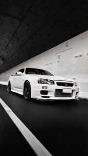 White Nissan Skyline GT R R34 Speeding Through Tunnel Wallpaper