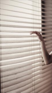 Woman Hand Touching Window Blinds Minimalist Aesthetic Mobile Wallpaper