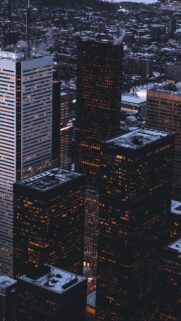 Stunning Aerial Cityscape at Twilight with Glowing Skyscrapers Wallpaper