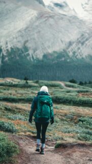 Solo Hiker Exploring Mountain Wilderness Phone Wallpaper