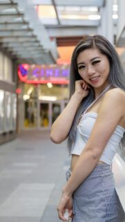 Stunning Asian Woman with Silver Hair Outdoor Portrait Mobile Wallpaper