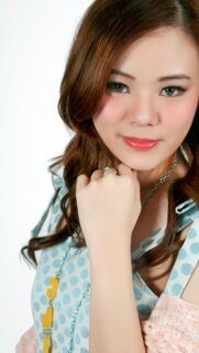 Beautiful Asian Girl with Polka Dot Dress Portrait Wallpaper
