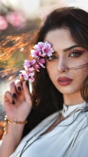 Beautiful Woman With Peach Blossoms Portrait Phone Wallpaper
