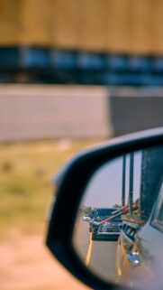 Cars in Side Mirror Reflection Highway View High Quality Wallpaper