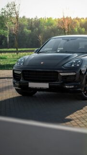 Black Porsche Cayenne SUV Front View Luxury Car Mobile Wallpaper