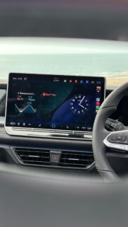 Modern Volkswagen Car Dashboard with Beach View Mobile Wallpaper