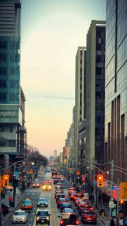 Urban Toronto City Street Traffic at Sunset Mobile Wallpaper