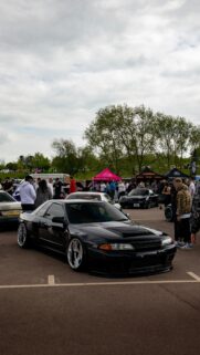 Stanced Black Nissan Skyline R32 JDM Car Show Mobile Wallpaper