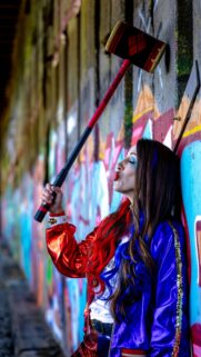 Harley Quinn Cosplay with Hammer and Bubblegum Mobile Wallpaper