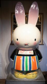 Cute Miffy Rabbit Statue in Traditional Dutch Clothing Wallpaper