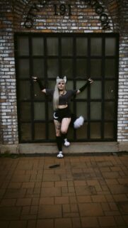 Cosplay Girl with Animal Ears and Tail Aesthetic Phone Wallpaper