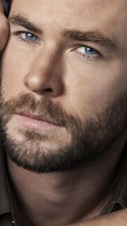 Chris Hemsworth HD Mobile Wallpaper: Epic Cinematic Portrait for Smartphone