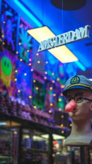 Quirky Amsterdam Captain Mannequin Neon City Life Mobile Wallpaper