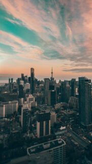 Breathtaking Sunset Over Toronto Skyline Mobile Wallpaper