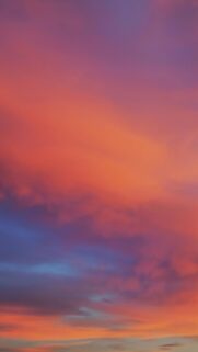 Stunning Vivid Sunset Sky with Golden Orange and Purple Clouds Wallpaper