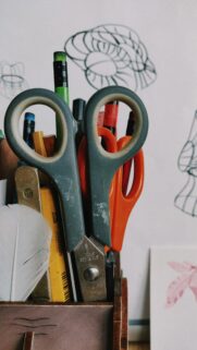 Artistic Desk Supplies with Scissors and Feather Mobile Wallpaper