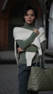 Stylish Woman in Olive Green Turtleneck and Sweater Fashion Wallpaper