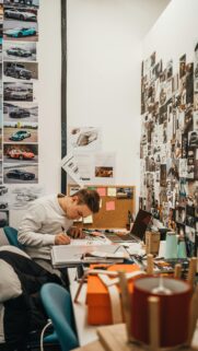 Creative Industrial Designer Sketching at Desk Desktop Wallpaper