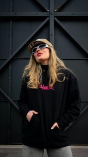 Stylish Blonde Woman in Streetwear Fashion Mobile Wallpaper