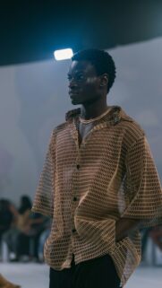 Stylish African Male Model in Brown Mesh Shirt Portrait Wallpaper