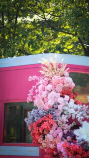 Stunning Pink Floral Bouquet on Vintage Carriage Mobile Wallpaper