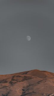 Waning Gibbous Moon Over Desert Hills Spiritual Energy Wallpaper