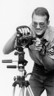 Funny Photographer Examining Mamiya Camera with Stethoscope Wallpaper