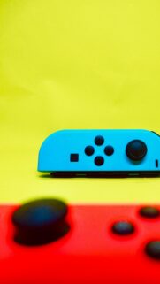 Neon Blue and Red Joy-Con Gaming Controller Aesthetic Mobile Wallpaper