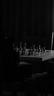 Dramatic Black and White Chessboard Strategy Phone Wallpaper