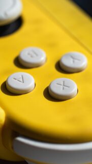 Close-up Yellow Game Controller Buttons High Resolution Wallpaper