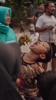 Indonesian Krupuk Eating Competition Mobile Phone Wallpaper