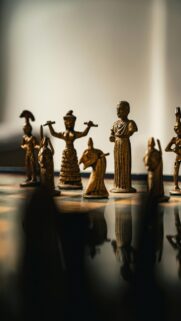 Ancient Bronze Chess Pieces Strategy Game Mobile Wallpaper