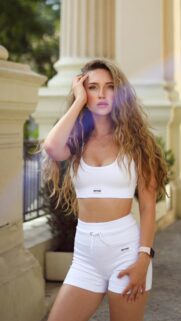 Beautiful Blonde Fitness Model in White Sportswear Portrait Wallpaper