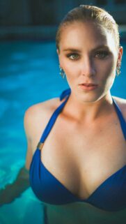 Stunning Woman in Blue Bikini Pool Portrait Mobile Wallpaper