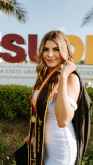 Beautiful Graduation Portrait Girl with Gold Sash Mobile Wallpaper