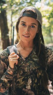 Stunning Young Woman in Camouflage Hunting Gear Phone Wallpaper