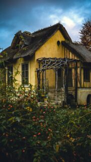 Rustic Yellow Cottage with Thatched Roof Cozy Autumn Wallpaper